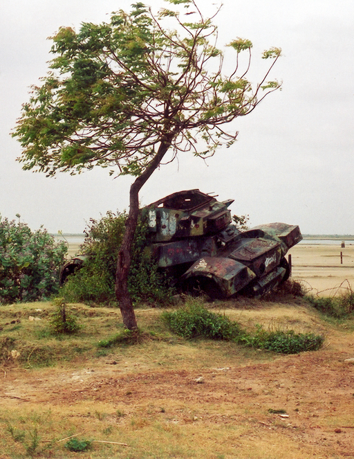 Elephant_Pass_rusting_tank final cropped Elephant Pass, Sri Lanka. A military tank rusting by a tree. 2006. Photo by Thomas Berg (see note below).